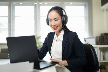 Business woman, call center consultant and laptop for customer service, support or advice in office....