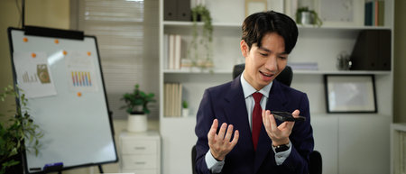 Businessperson using AI Agent virtual assistant with voice waveform interface. Concept of artificial...