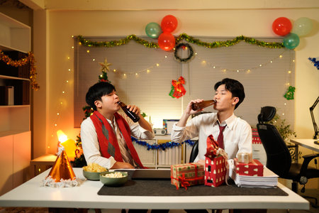 Celebrating Christmas and new year in office.の写真素材