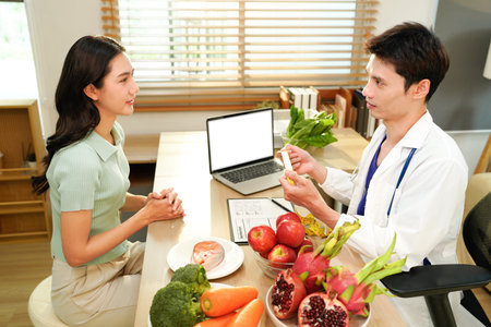 The healthcare professional providing nutritional guidance to a patient..の写真素材