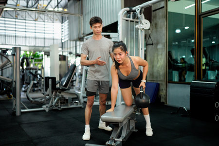 gym sport fitness exercise health woman weight training kettlebell trainer coach instructor personal...