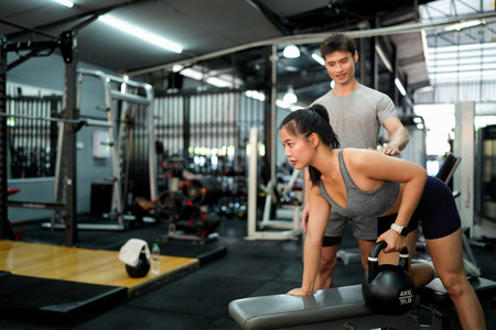 gym sport fitness exercise health woman weight training kettlebell trainer coach instructor personal...