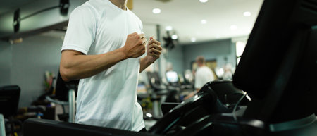 gym sport fitness exercise health healthy man treadmill training running equipment fit machine active workout body woman activity athlete cardio run club.の写真素材