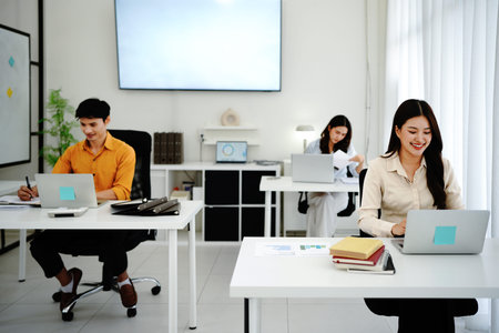 Female leader, manager or CEO with a smile, mission and vision in the office and her team in the...