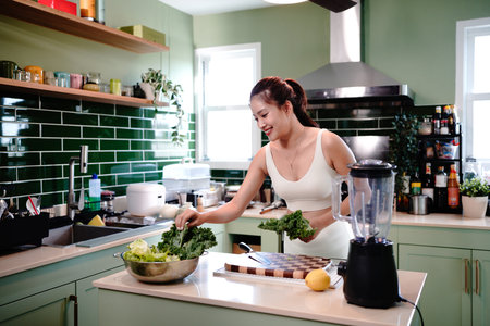 Portrait of beauty healthy asian woman making green vegetables detox cleanse and green fruit...