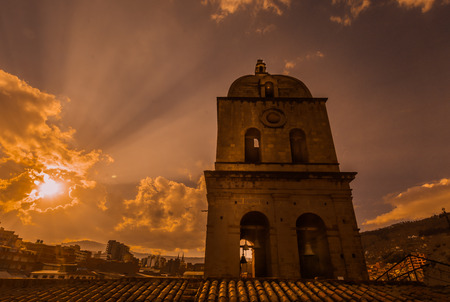 The church bell tower under the sunlightの写真素材