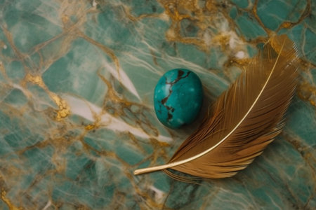 turquoise easter egg and gold featherle background.の素材