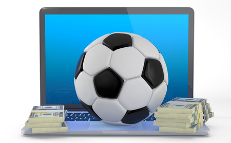 On Line Soccer Betting Concept (3D Render).
A soccerball and some wad of dollars on laptop isolated on white background.の写真素材