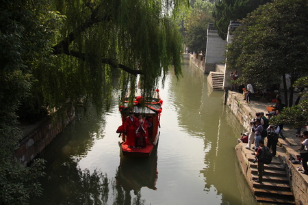 October 15, 2014, JIANGNAN: Scenery of ancient traditional Chinese wedding ceremony at the canal.のeditorial素材