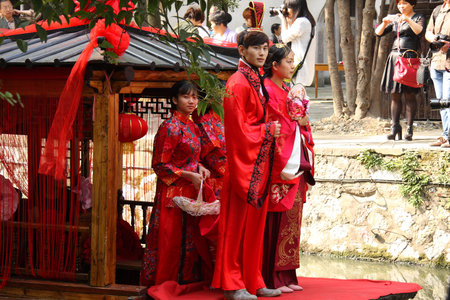 October 15, 2014, JIANGNAN: Scenery of ancient traditional Chinese wedding ceremony at the canal.のeditorial素材