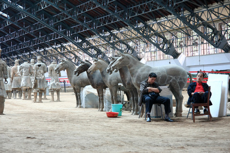 Terracotta Warriors pit located in this Lintong, Shaanxi Province, is one of the greatest discoveries and Horses of Qin Shi Huang Mausoleum Pictured staff rest.のeditorial素材