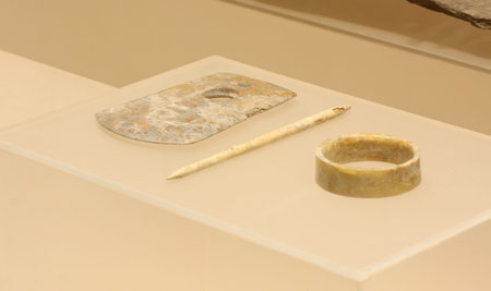 From left to right are: jade ax, jade ornaments cone, Yuhuan (Liangzhu Culture), collections in Huzhou, Zhejiang Museum.のeditorial素材