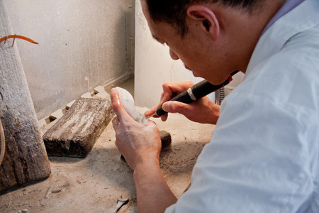Process of the jade furnishing in factory located at Ruili, Yunnan provinceのeditorial素材