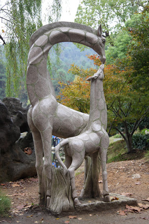  deer feeding sculptureの写真素材