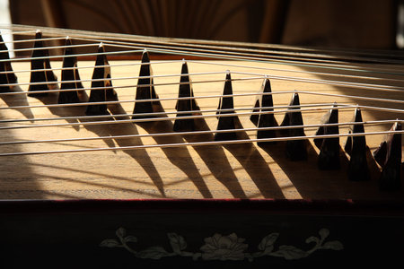 Close up of strings on the guzheng