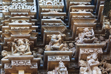 Ancient basrelief at famous erotic temple in Khajuraho Chhatarpur district of Madhya Pradesh Indiaのeditorial素材