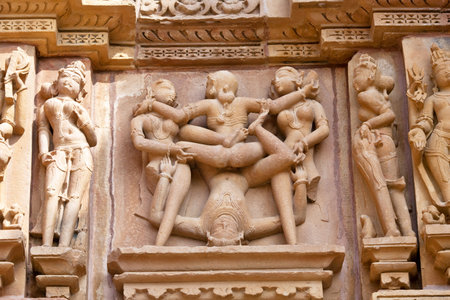 19012010 Ancient erotic basrelief at famous erotic temple in Khajuraho Chhatarpur district of Madhya Pradesh Indiaのeditorial素材