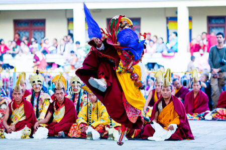 KATHMANDU, NEPAL - MARCH 25: Buddhist monk performing Mahakala dance during Cham Mystery at Shechen monastery on March 25, 2010 in Kathmandu, Nepal. Cham dances are considered a form of meditation and an offering to the gods.のeditorial素材