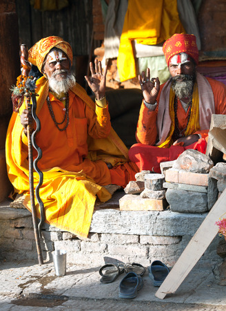 KATHMANDU, NEPAL - NOVEMBER 13: Shaiva sadhu seeks alms on the street on November 13, 2009 in Kathmandu, Nepal.のeditorial素材