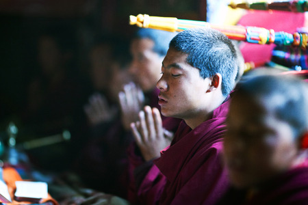 LHO, GORKHA, NEPAL - NOVEMBER 28: Buddhist monks poses for a photo during puja ceremony in Lho monastery on November 28, 2009 in Manaslu conservation area, Nepal.のeditorial素材