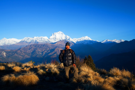 Sherpa trekking Guide poses for a photo at Poon Hill on December 20, 2009 in Annapurna National Park, Nepalのeditorial素材