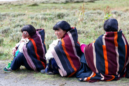 DHO TARAP, DOLPO, NEPAL - SEPTEMBER 11: Women in national clothes waiting for Puja ceremony during Full Moon Festival on September 11, 2011 in Dho Tarap village, Nepalのeditorial素材