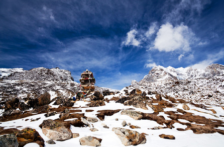 Stone Chorten on the road to Everest Base Camp - mountain landscape in Sagarmatha National Park in the Nepal Himalayaの写真素材