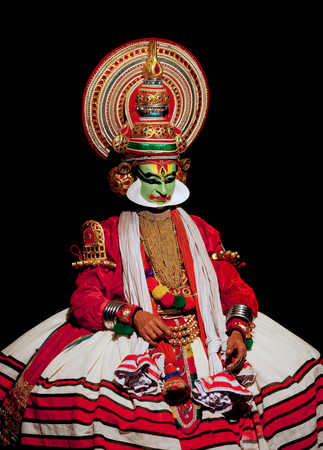 VARKALA, INDIA - FEBRUARY 3, 2010: Kathakali actor performing on the evening show in Varkala, Kerala, South India. Kathakali is the ancient classical dance form of Kerala.のeditorial素材