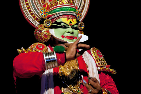 VARKALA, INDIA - FEBRUARY 4, 2010: Kathakali actor performing on the evening show in Varkala, Kerala, South India. Kathakali is the ancient classical dance form of Kerala.のeditorial素材