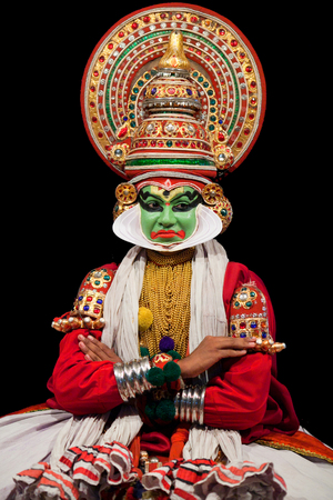 FORT COCHIN, INDIA - FEBRUARY 16, 2010: Actor performing traditional Indian dance-drama Kathakali in Fort Cochin, South India. Kathakali - the classical dance-drama of Kerala based on Indian mythology, and noted for its elaborate costumes and gestures.のeditorial素材