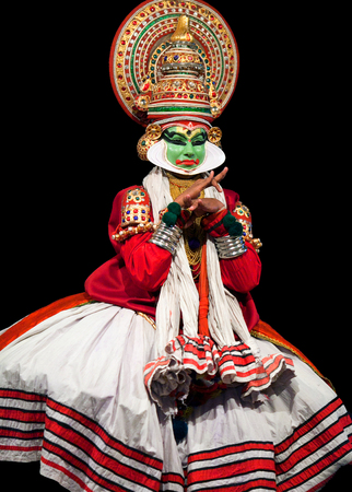 FORT COCHIN, INDIA - FEBRUARY 16, 2010: Actor performing traditional Indian dance-drama Kathakali in Fort Cochin, South India. Kathakali - the classical dance-drama of Kerala based on Indian mythology, and noted for its elaborate costumes and gestures.のeditorial素材