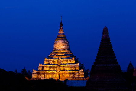 Shwesandaw Pagoda in Bagan, Myanmar. The pagoda was built by King Anawrahta in 1057. Shwezandaw Paya is a favorite sunset viewing point, with loads of tourists.の写真素材