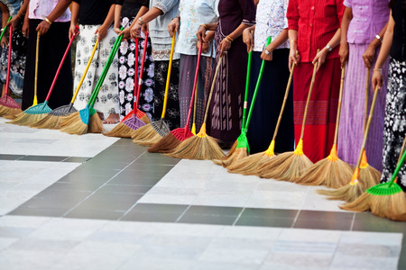 Unidentified women washing the floor at  Shwedagon Paya in Yangon, Myanmarの写真素材