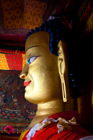 Beautiful sculpture of Gautama Buddha in Shey Monastery in Leh, Ladakh, Jammu and Kashmir, India. The main Shakyamuni Buddha statue in the monastery is a 12 metres (39 ft) icon covering three floors of the monastery.のeditorial素材