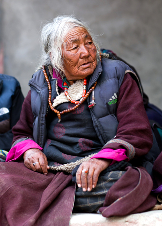 Ladakhi woman in national clothes poses for a photo during Yuru Kabgyat festival at Lamayuru Gompa on June 17, 2012 in Leh, Indiaのeditorial素材
