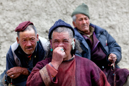 Three men praying in Lamayuru Gompa during Yuru Kabgyat festival at Lamayuru Gompa on June 17, 2012...