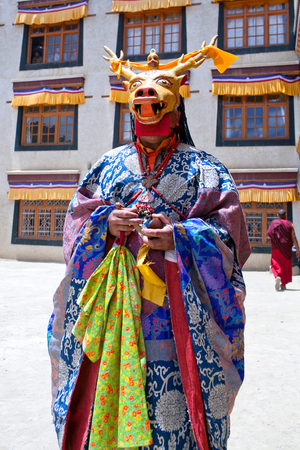 LAMAYURU, INDIA - JUNE 17, 2012: Buddhist monk in Deer mask dancing Cham mystery during Yuru Kabgyat festival at Lamayuru Gompa in Ladakh, Jammu and Kashmir, North Indiaのeditorial素材