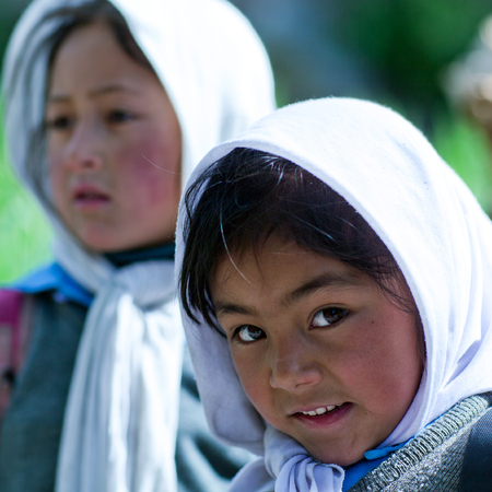 Balti students poses for a photo during their break time on June13, 2012 in Turtuk Village, Ladakh, Indiaのeditorial素材
