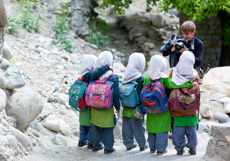 TURTUK, INDIA - JUNE 13, 2012: Children from Baltistan poses for a photo during her break time in Turtuk Village, Ladakh, Indiaのeditorial素材