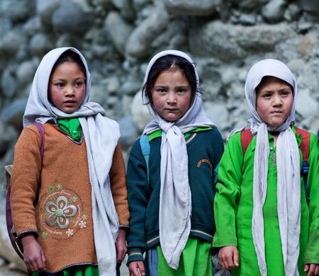 TURTUK, INDIA - JUNE 13: Balti girls students poses for a photo during their break time on June13, 2012 in Turtuk Village, Ladakh, Indiaのeditorial素材