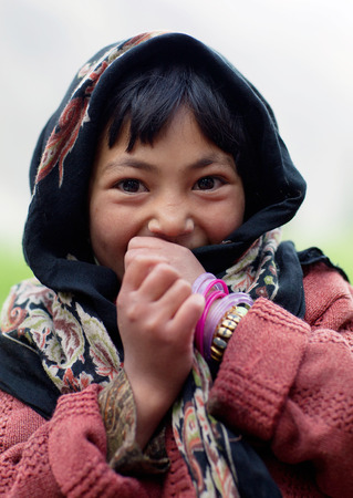Balti shoolgirl poses for a photo during her break time on June 13, 2012 in Turtuk Village, Ladakh, India. Turtuk village opened to foreign tourists in 2010.のeditorial素材