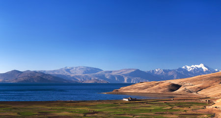 Tso Moriri lake and Korzok village in Ladakh, Jammu and Kashmir, North India. The lake is at an altitude of 4 595 m; it is the largest of the high altitude lakes in the Trans-Himalayan biogeographic region.の写真素材
