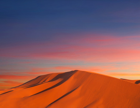 Sand dunes in Sahara desert at sunsetの写真素材