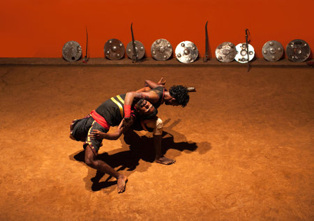 KERALA, INDIA - JANUARY 18, 2016: Indian fighters performing Kalaripayattu marital arts demonstrationのeditorial素材