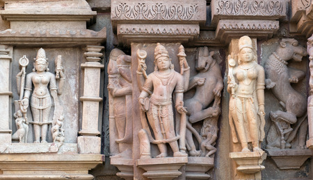 Ancient bas-relief at famous erotic temple in Khajuraho, India. Most Khajuraho temples were built between 950 and 1050 by the Chandela dynasty.の写真素材