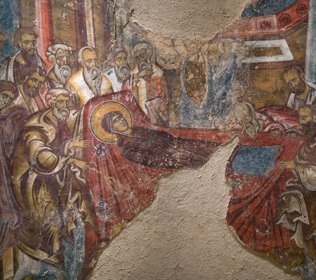 VASARAS, GREECE - MARCH 17, 2018: Ancient wall painting with the Dormition of the Virgin in Palaio Panagia Monastery in Laconiaのeditorial素材