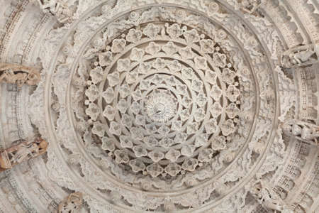 RANAKPUR, INDIA - JANUARY 8, 2019: Ceiling decoration with dancing Apsaras and Surasundaris in famous ancient Adinath Jain temple in Rajasthan stateのeditorial素材