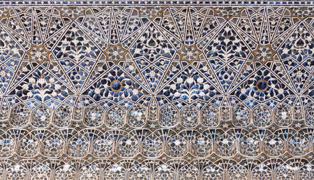 JAIPUR, INDIA - JANUARY 3, 2019: Ceiling decoration at Sheesh Mahal palace (Hall of Mirrors), also called Jai Mandir, in Amber Fort, Rajasthan stateのeditorial素材