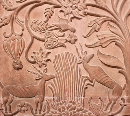 Ancient stone bas-relief with flowers and animals in Junagarh fort in Bikaner, Rajasthan, Indiaのeditorial素材