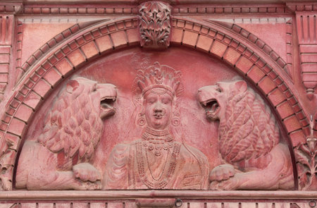 Ancient bas-relief of Colonial Rulers on the outer wall of Rampuria Haveli in Bikaner, Rajasthan,...
